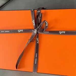 Orange Hermes shoe box and ribbon included.